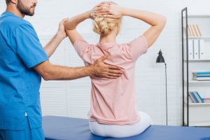 physiotherapist doing massage