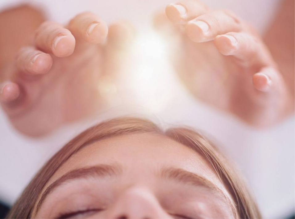 Soft, diffused light over an energy-medicine session at The Teal Center